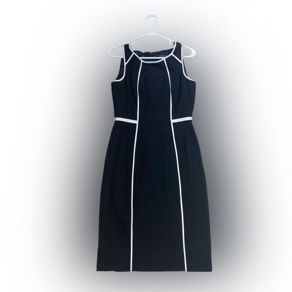 White House black market. Black dress with white piping. Size 2